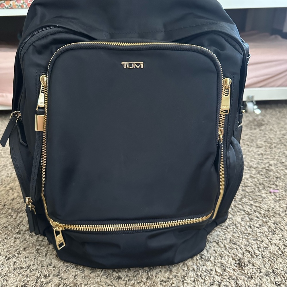 Tumi Celina Black and Gold Backpack